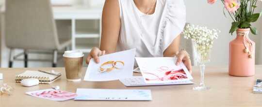 Female Wedding Planner Working in Office