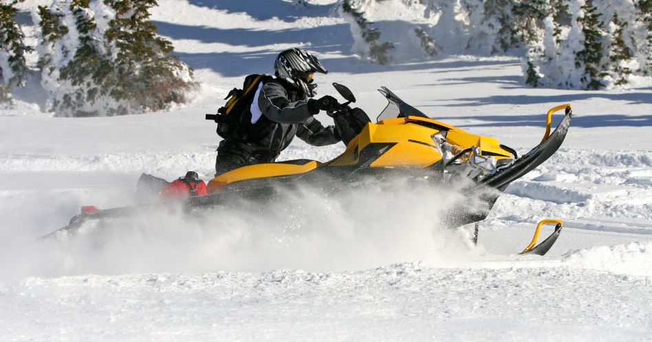 yellow snowmobile